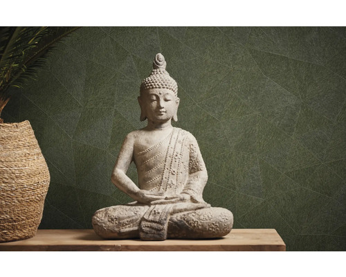 Buddha Statue aus Stein auf einem Tisch