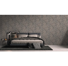 Schlafzimmer mit Bett und Wandgestaltung