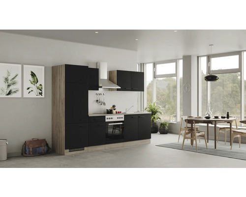 Cuisine claire avec kitchenette et table à manger