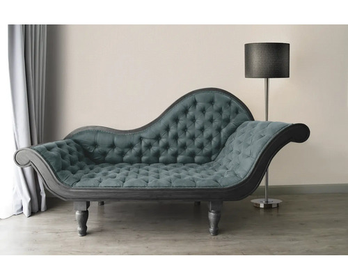 Chaiselongue mit Knopfheftung und Stehlampe