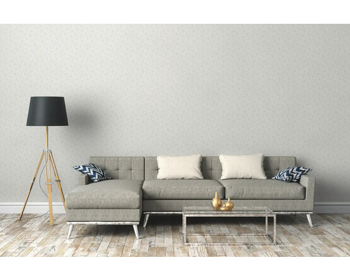 Salon avec canapé, lampadaire et table