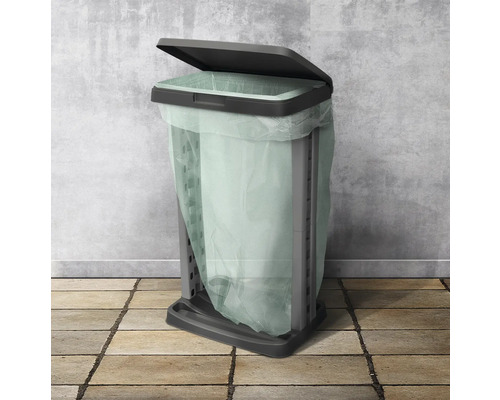 Poubelle avec couvercle ouvert et sac poubelle