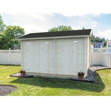Abri de jardin en bois avec toit foncé dans le jardin