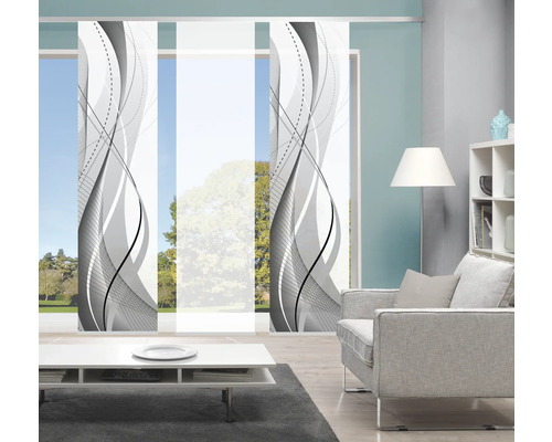 Salon avec rideaux coulissants à motif ondulé comme décoration de fenêtre