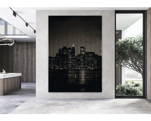 Dekoratives Wandbild mit Skyline-Motiv in einem modern gestalteten Raum.