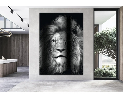 Dekoratives Wandbild mit Löwenmotiv in einem modern gestalteten Raum.
