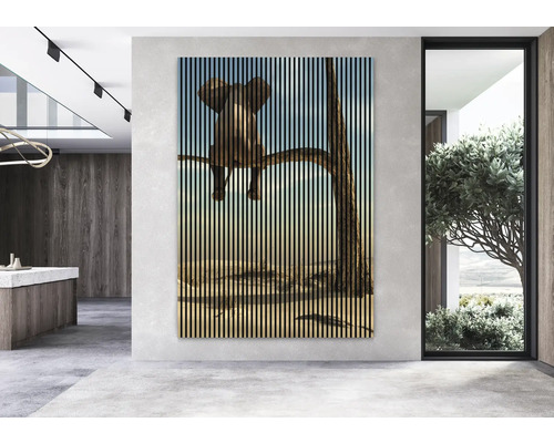 Wandbild mit einem Elefanten auf einem Ast in einem modern eingerichteten Raum