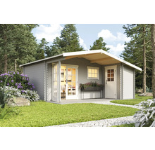 Abri de jardin en bois avec double porte, fenêtre et auvent dans le jardin