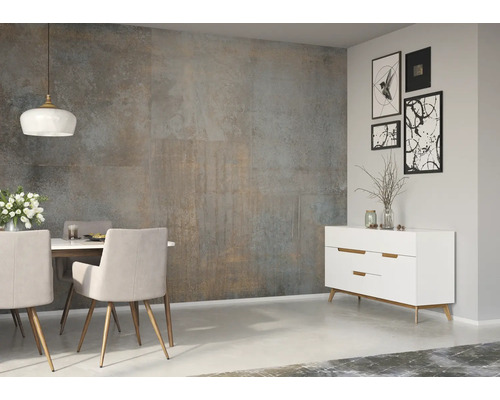 Salle à manger avec table, chaises, buffet et carreaux muraux aspect béton