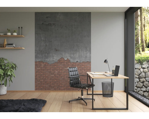 Modernes Arbeitszimmer mit Schreibtisch, Bürostuhl und Wandgestaltung in Ziegeloptik