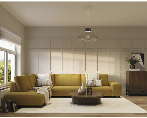 Salon avec canapé d''angle, table basse et tapis