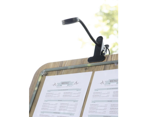 Klemmleuchte mit flexiblem Arm auf einer Menütafel