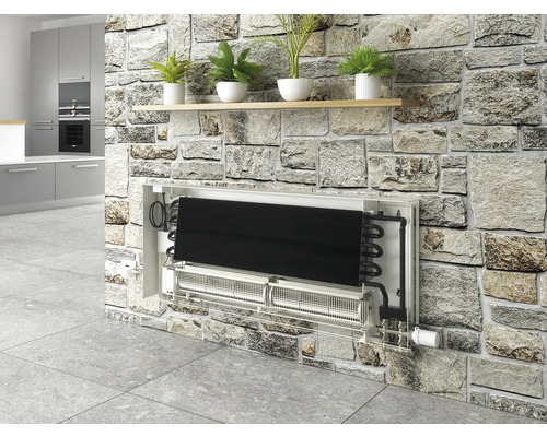 Modernes Interieur mit Heizkörper in Steinwand