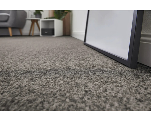 Gros plan d'un tapis texturé dans un espace de vie