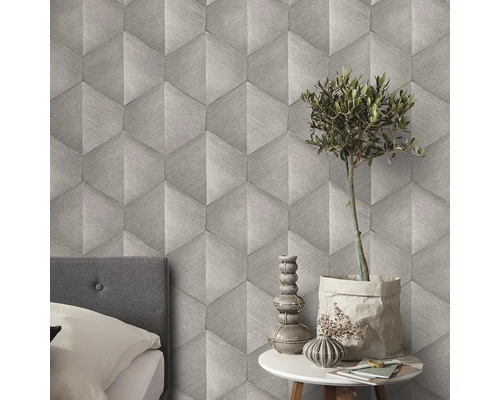 Gemusterte Tapete mit geometrischem Design im Schlafzimmer.