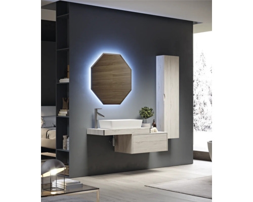 Salle de bains moderne avec lavabo, miroir avec éclairage et armoire haute