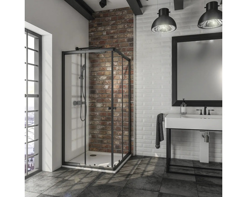 Salle de bains avec cabine de douche, lavabo et miroir de style industriel