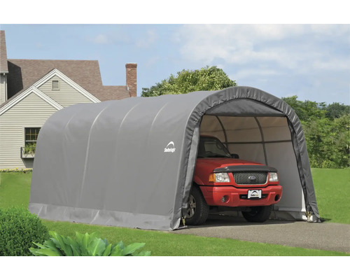 Garage auto grise avec un véhicule rouge