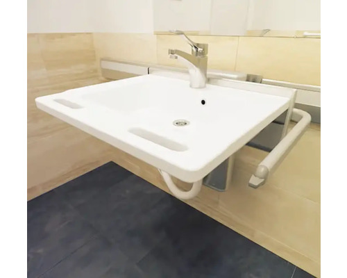 Weißes Waschbecken mit Haltegriff und Armatur im Badezimmer