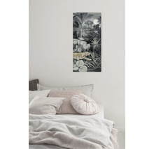 Wandbild mit Dschungelmotiv und Tiger über einem Bett