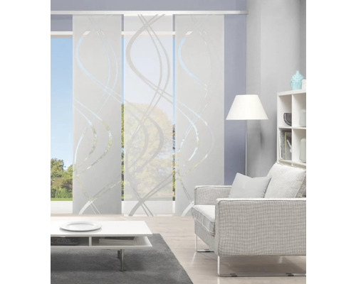 Salon avec rideau coulissant à motif ondulé devant la fenêtre.