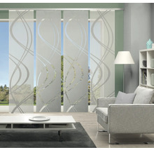 Salon avec rideaux coulissants à motif ondulé