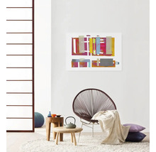 Salon avec tapis, fauteuil, tableau et tables d''appoint