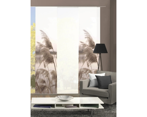 Salon avec rideaux coulissants à motif naturel