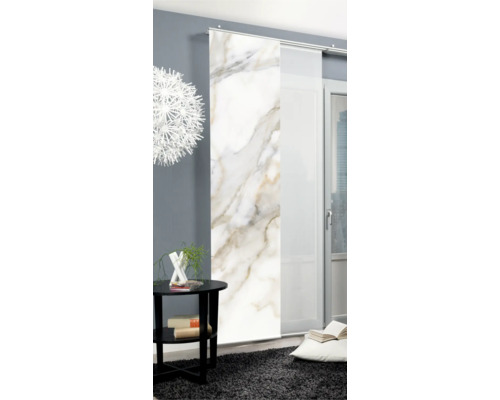 Pièce avec des panneaux coulissants à motif marbré à côté d''une table ronde