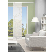 Salon avec panneau coulissant à motif de cercles devant la fenêtre