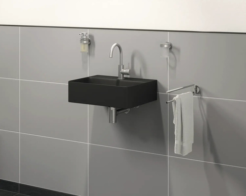 Badezimmer Waschbecken mit Armatur, Seifenspender und Handtuchhalter