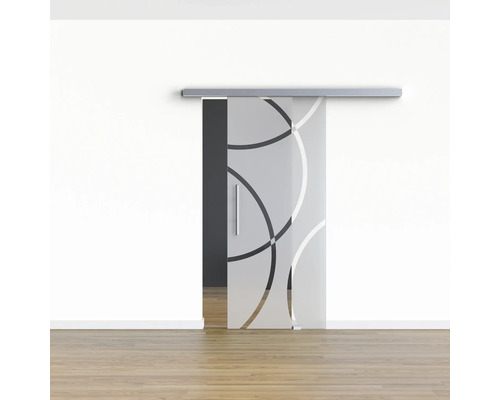 Schiebetür aus Glas mit Kreismuster vor einer weißen Wand