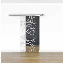 Porte coulissante en verre avec motif devant un mur