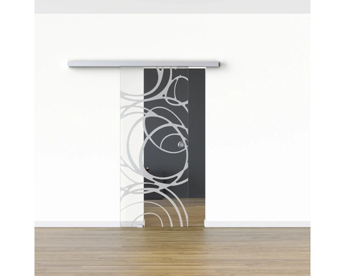 Porte coulissante en verre avec motif devant un mur