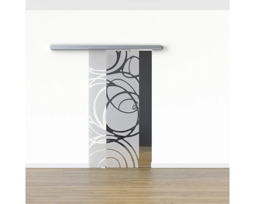 Schiebetür aus Glas mit Muster vor einer Wand