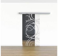 Porte coulissante en verre avec motif devant un mur