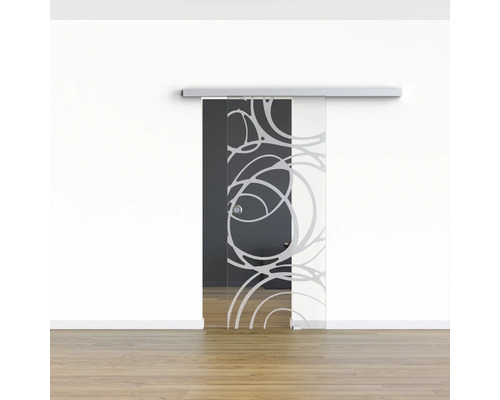 Schiebetür aus Glas mit Muster vor einer Wand