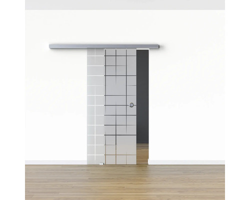 Schiebetür aus Glas mit Gittermuster in einem hellen Raum.