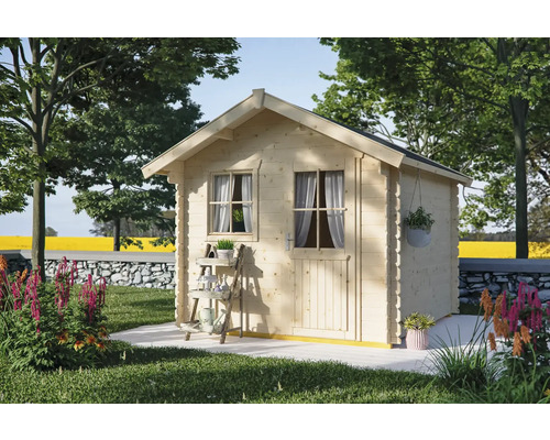 Abri en madriers SKAN HOLZ Porto avec plancher 280 x 255 cm naturel Abri de jardin en bois avec fenêtre et porte dans un jardin avec des arbres et des fleurs.