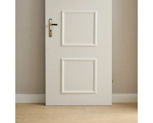 Porte intérieure blanche avec cadre et poignée de porte