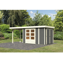 Abri de jardin en bois avec auvent dans le jardin