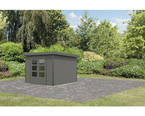 Abri de jardin en bois avec porte double dans le jardin