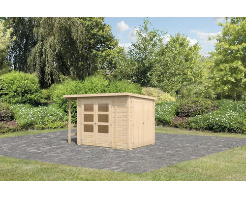 Abri de jardin en bois avec auvent et double porte dans le jardin