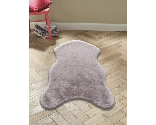 Kunstfell Teppich auf Holzboden