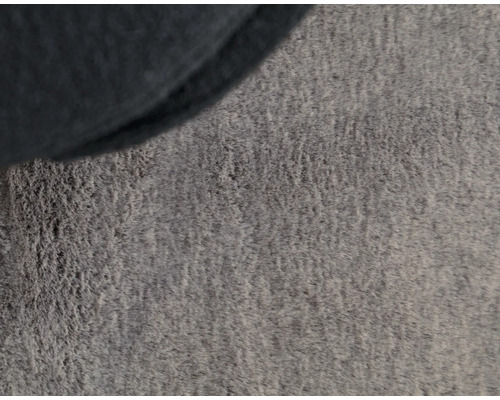 Gros plan d''un tapis gris avec un bord foncé