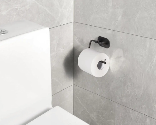 Porte-papier toilette avec papier toilette sur un mur de salle de bains