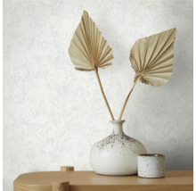 Gros plan d''un papier peint structuré blanc avec vase et décoration