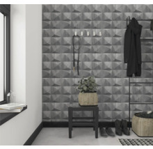 Entrée avec papier peint à effet 3D gris, porte-manteau et accessoires pour une maison élégante.