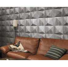 Salon avec canapé en cuir marron et panneaux muraux aspect bois avec design tridimensionnel