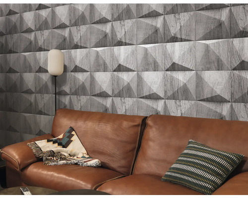 Salon avec canapé en cuir marron et panneaux muraux aspect bois avec design tridimensionnel